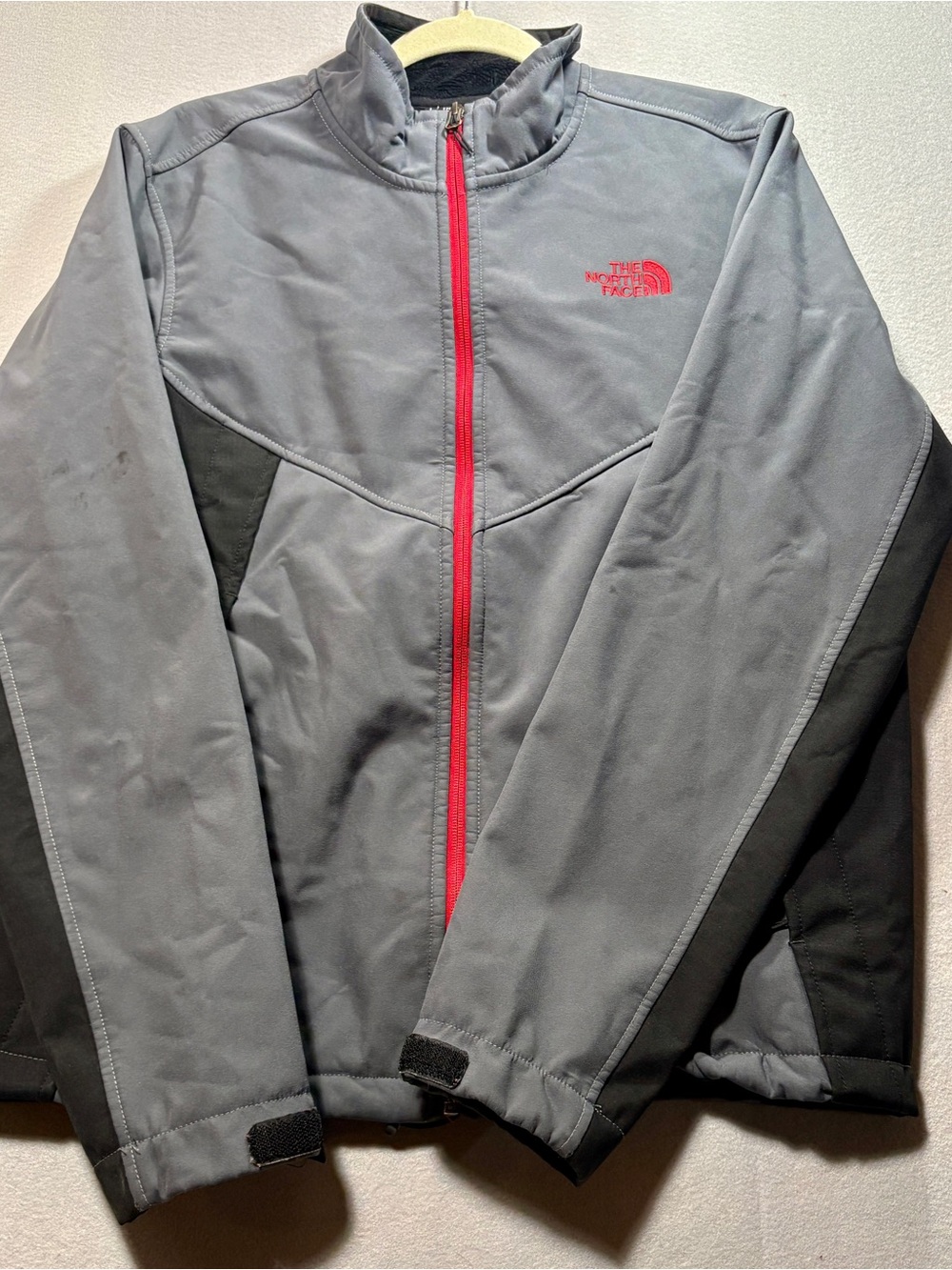 The North Face Gray Jacket with Red Zip & Logo